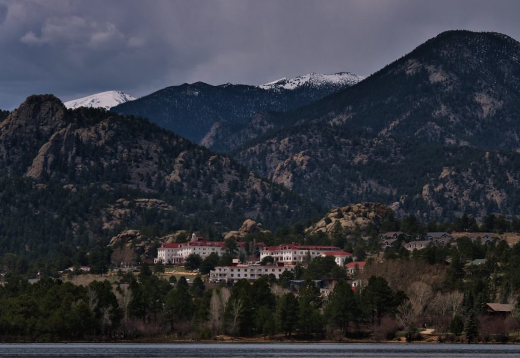 The Stanley Hotel with mountains