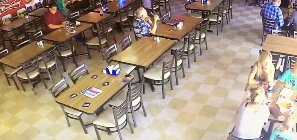 Still from CCTV showing eating area and chair moving