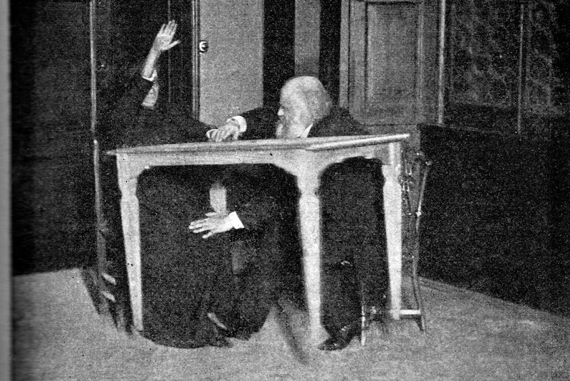 Eusapia Palladino 'levitating' a table