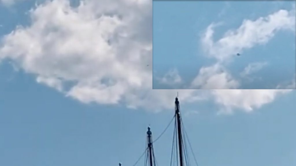 Image showing a blurring shape or orb in sky above Oslo. Videographer claims it was a UFO of some sort.